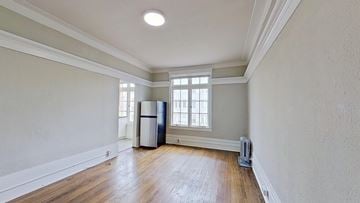 San Francisco apartment for rent - A room with a window and a radiator on the floor.