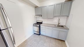 San Francisco apartment for rent - A kitchen with a refrigerator, dishwasher, and sink.