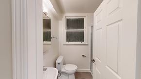 San Francisco apartment for rent - A white toilet and sink in a small bathroom.