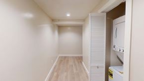 San Francisco apartment for rent - A white kitchen with a fridge and oven.