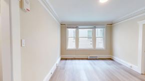 San Francisco apartment for rent - A room with a window and a radiator on the wall.