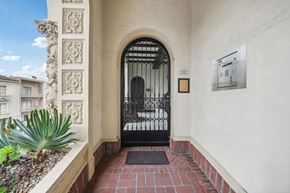 San Francisco apartment for rent - the front door of a building with a wrought iron gate