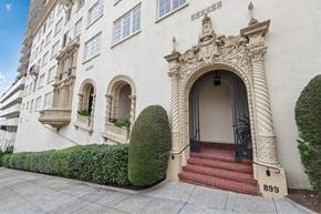 San Francisco apartment for rent - the exterior of a white building with stairs and a door