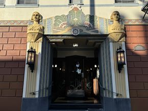 San Francisco apartment for rent - A building with a decorative entrance and two statues on top.