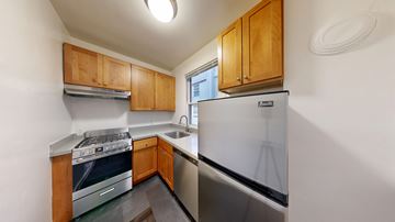 San Francisco apartment for rent - A kitchen with a stove, sink, and refrigerator.