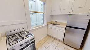 San Francisco apartment for rent - A kitchen with a stove, sink, and refrigerator.