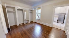 San Francisco apartment for rent - A room with wooden floors and white walls.