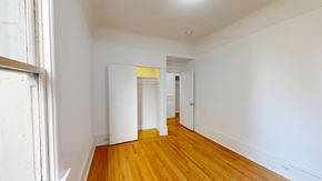 San Francisco apartment for rent - A room with wooden floors and white walls.