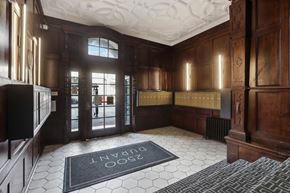 Berkeley apartment for rent - Grand entrance to a building, featuring a large wooden door with a glass window