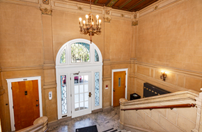 San Francisco apartment for rent - Elegant lobby with a grand staircase and a chandelier