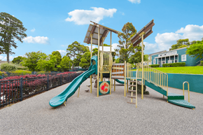 San Francisco townhouse for rent - Playground located in an apartment community, featuring a slide equipped with a protective cover for added safety.