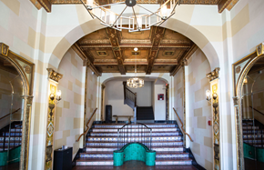 San Francisco apartment for rent - Grand hallway with a high ceiling, a chandelier, and a staircase