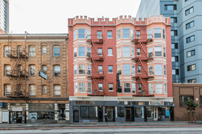 San Francisco apartment for rent - A red building with a spiral staircase on the side.