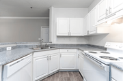 Morrow apartment for rent - A kitchen with white appliances and cabinets.