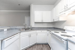 Morrow apartment for rent - A kitchen with white appliances and cabinets.