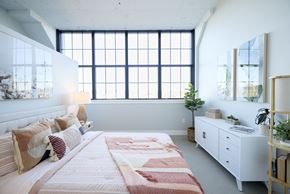 Biddeford apartment for rent - A bedroom with a large bed and a window.