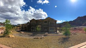 Springdale apartment for rent - Front of Property With Blue Skies at Moenave Townhomes in Springdale, Utah