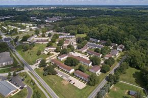 Kent apartment for rent - an aerial view of a city with houses and trees