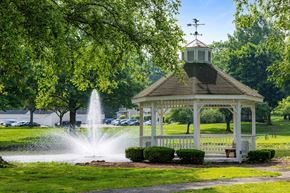 Cuyahoga Falls townhouse for rent - A gazebo with a fountain in front of it.