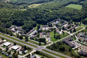 Kent apartment for rent - an aerial view of a city with buildings and trees