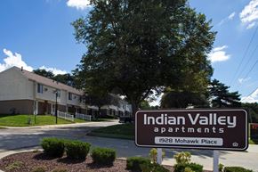 Kent apartment for rent - a sign valley apartments in front of a tree