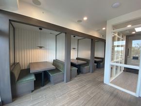 Minneapolis apartment for rent - a room with a table and chairs and a door