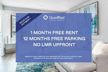 Brampton apartment for rent - A room with a couch and a poster that says "1 MONTH FREE RENT 12 MONTHS FREE PARKING NO LMR UPFRONT".