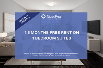 Cambridge apartment for rent - A room with a bed and a lamp with a QuadReal advertisement offering 1.5 months free rent on 1 bedroom suites.
