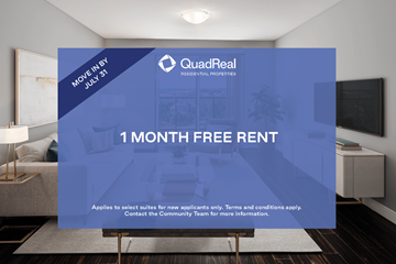 Cambridge apartment for rent - A room with a poster advertising a 1 month free rent offer.
