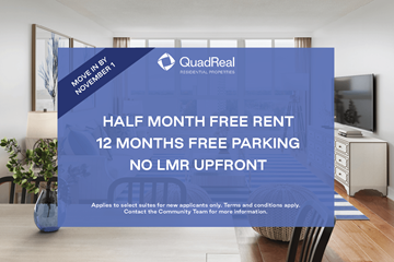 Mississauga apartment for rent - A blue advertisement board in a room offering free rent and parking.