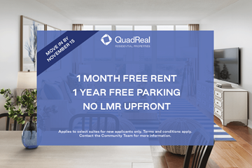 Mississauga apartment for rent - A blue advertisement board in a room offering free rent and parking.
