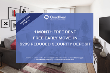 Calgary apartment for rent - A room with a QuadReal advertisement offering a free month's rent and a reduced security deposit.