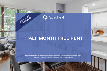 Toronto apartment for rent - A room with a sign that says "Half Month Free Rent" in front of a window.