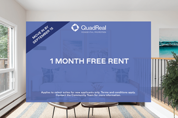 Burlington townhouse for rent - A room with a QuadReal advertisement for a free one month rent.