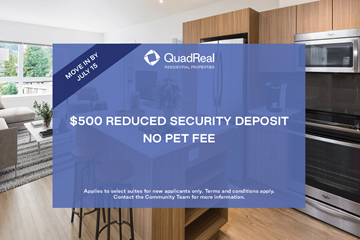 North Vancouver apartment for rent - A kitchen with a sign advertising a $500 reduced security deposit from QuadReal.