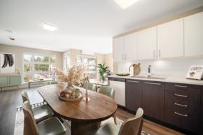 North Vancouver apartment for rent - Staged kitchen looking through to spacious living room.