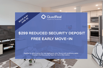 Calgary apartment for rent - A living room with a QuadReal advertisement for a reduced security deposit.
