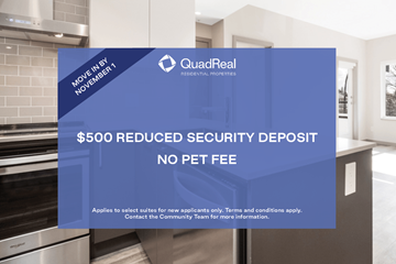 North Vancouver apartment for rent - A kitchen with a QuadReal advertisement offering a $500 reduced security deposit with no pet fee.