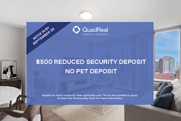 Vancouver apartment for rent - A sign advertising a $500 reduced security deposit for QuadReal Real Estate Services.