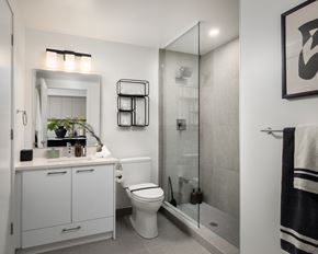 Mississauga apartment for rent - a small bathroom with a shower toilet and sink