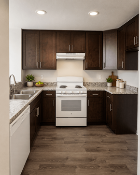 Loma Linda apartment for rent - A modern kitchen with a white stove top oven and dark brown cabinets.