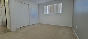 Bellflower apartment for rent - a bedroom with a closet and a window at Villa La Paz Apartments, California, 90706