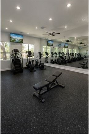 Johnson City apartment for rent - A gym with a variety of equipment including treadmills, exercise bikes, and weight benches.