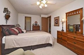Lapeer apartment for rent - Master Bedroom At Turill Estates 1844 Raleigh Ave #18, Lapeer, MI 48446