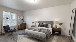 Radcliff apartment for rent - A bedroom with a large bed, a chair, and a nightstand.