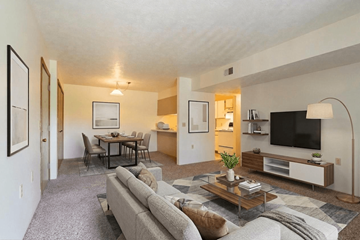 Somerset apartment for rent - A living room with a grey couch and a coffee table.