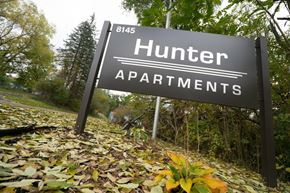 Middeville apartment for rent - a sign for the hunter apartments on the side of a road