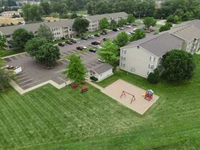 Lebanon apartment for rent - an aerial view of a playground in a parking lot