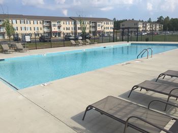 Swimming pool with lounge chairs
