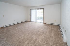 Port Austin apartment for rent - Living room Crawford Apartments, 8640 Independence Ave, Port Austin, MI 48467